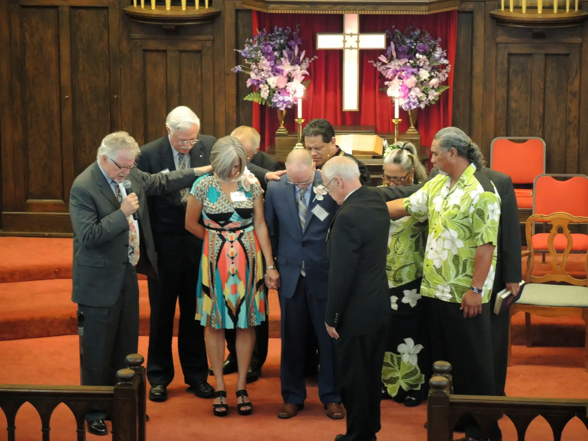 Pastor Scott and Rhonda Archer being prayed for at installation service 